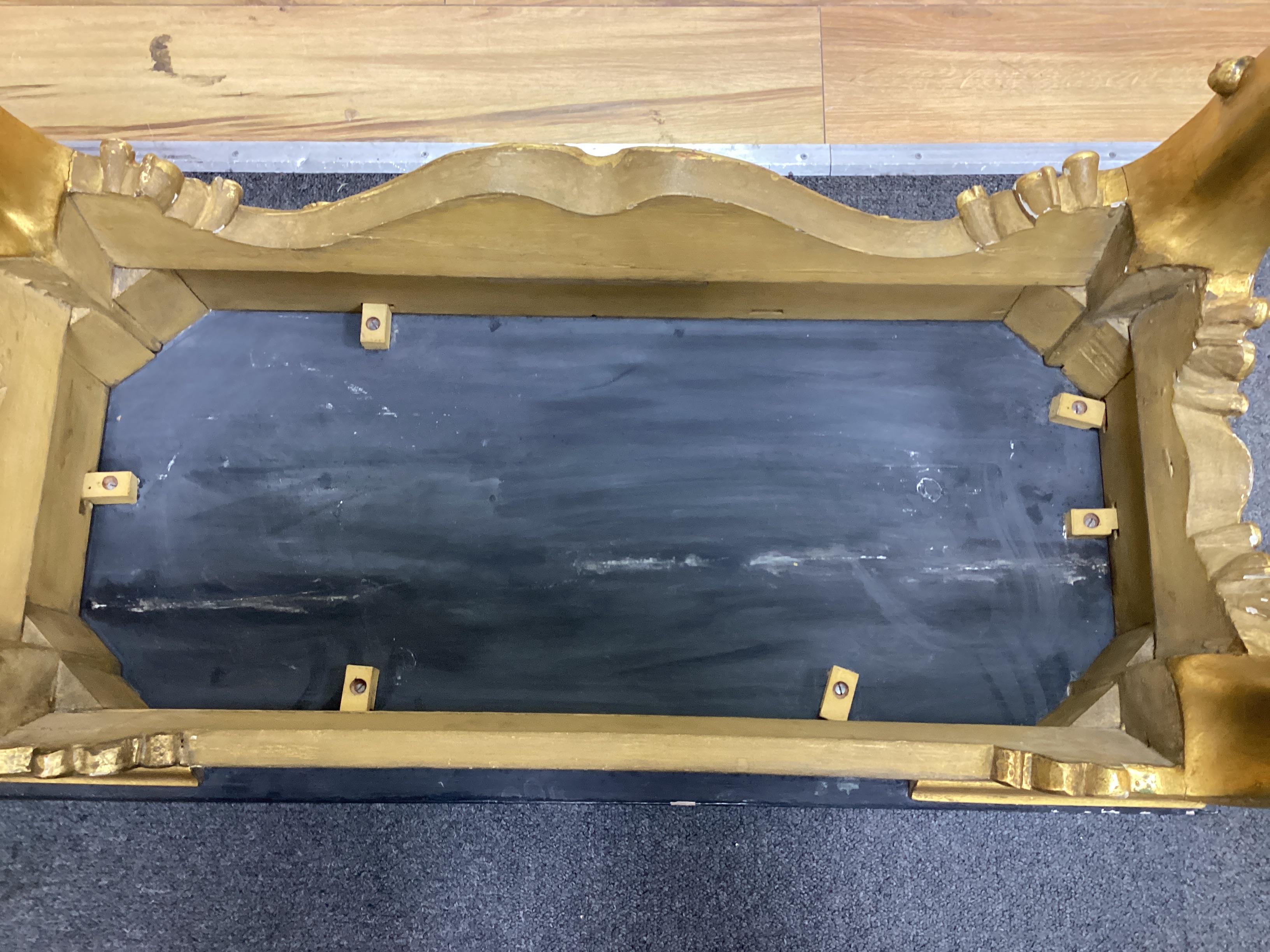A George II style giltwood pier table, width 91cm, depth 45cm, height 79cm and a similar pier glass, width 61cm, height 115cm